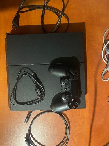 PS4 1T + CONTROLLER + GAMES