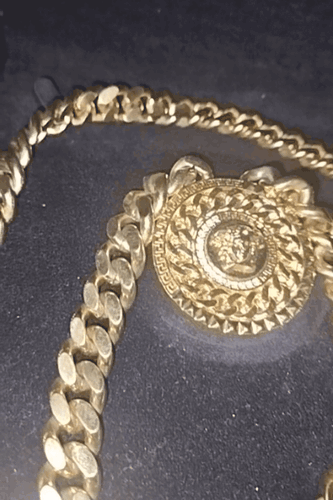 Περισσότερες πληροφορίες για "Versace's Gold Medusa Medallion Chain & Bracelet"