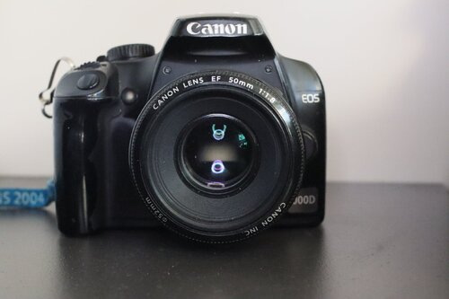 Περισσότερες πληροφορίες για "Canon EOS 1000D με φακό"