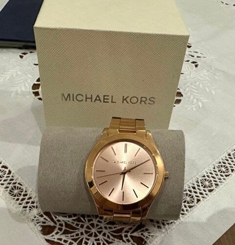 Περισσότερες πληροφορίες για "Michael Kors"