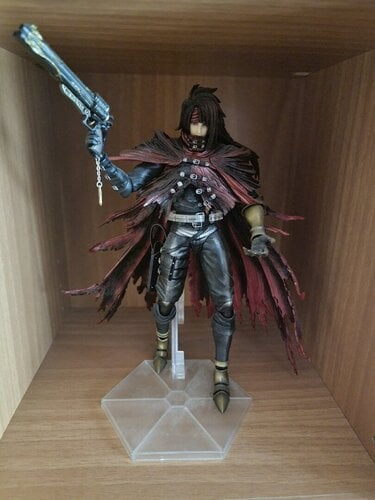 Περισσότερες πληροφορίες για "FINAL FANTASY VII ADVENT CHILDREN PLAY ARTS Kai Vincent Valentine Figure"