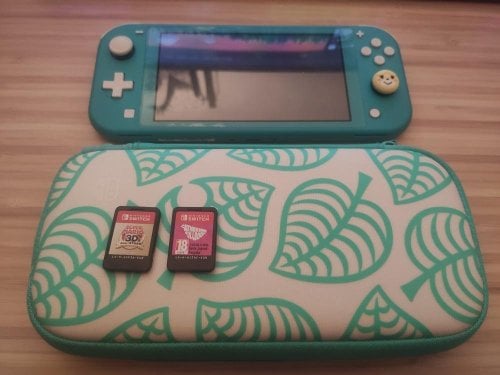 Περισσότερες πληροφορίες για "Nintendo Switch Lite με Θήκη και 2 games"