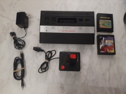 Παιχνιδομηχανη 1990 Retro Κονσόλα video ( console ) με χειριστηριo παιχνιδια στη μνημη και 2 κασετες