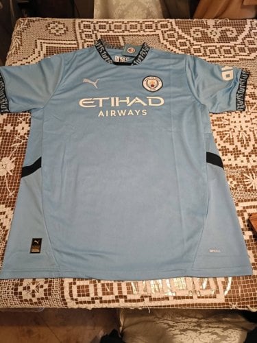 Περισσότερες πληροφορίες για "Manchester City 2024/25 Football Jersey"