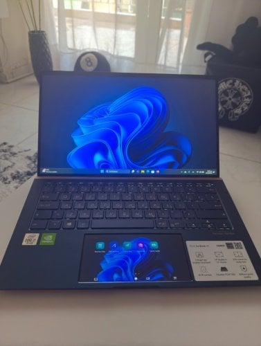 Περισσότερες πληροφορίες για "Asus ZenBook 14 i7"