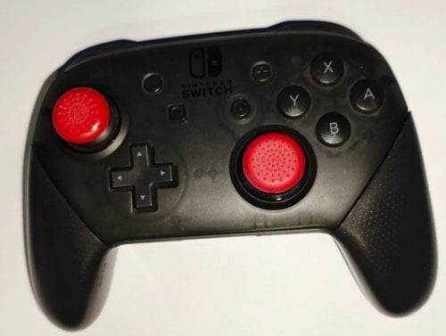 Περισσότερες πληροφορίες για "Nintendo Switch Pro Controller Ασύρματο για Switch Μαύρο"