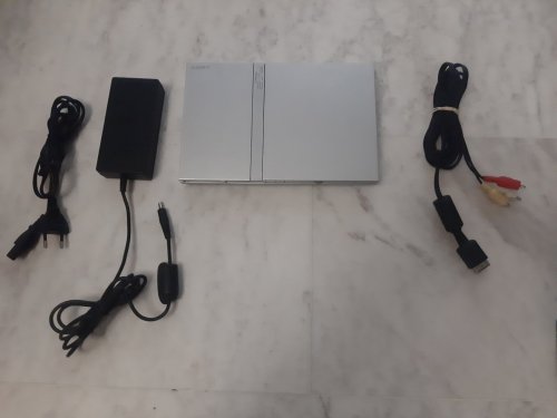 Περισσότερες πληροφορίες για "SONY PLAYSTATION 2 slim ( PS2 slim ) silver Κονσόλα με καλωδια για ανταλλακτικα , επισκευη ασημι"
